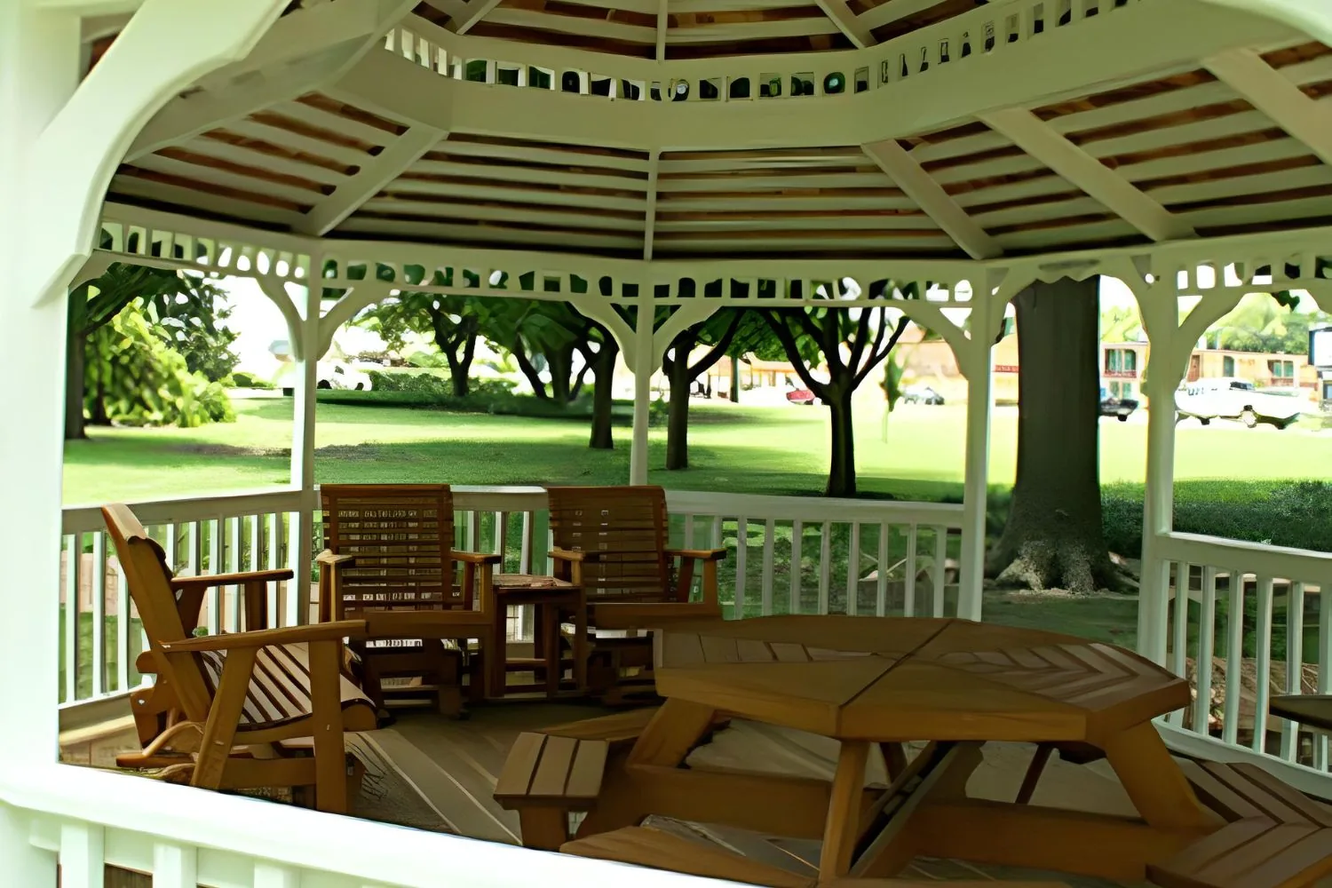 Inside of a gazebo with bench