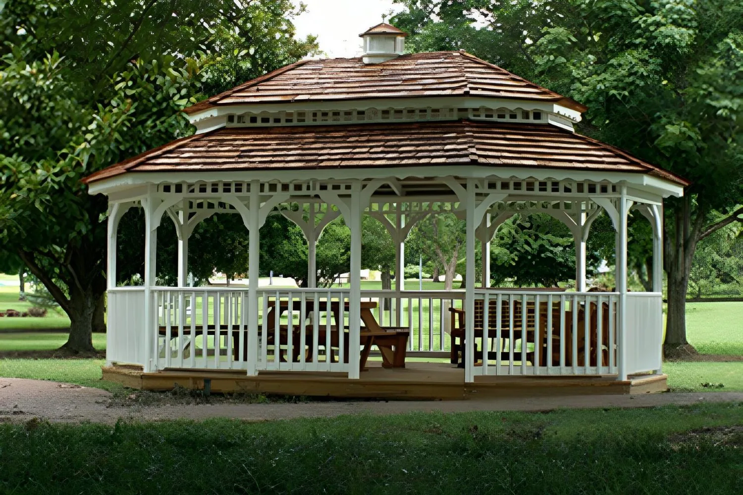 White and brown gazebo amongst trees