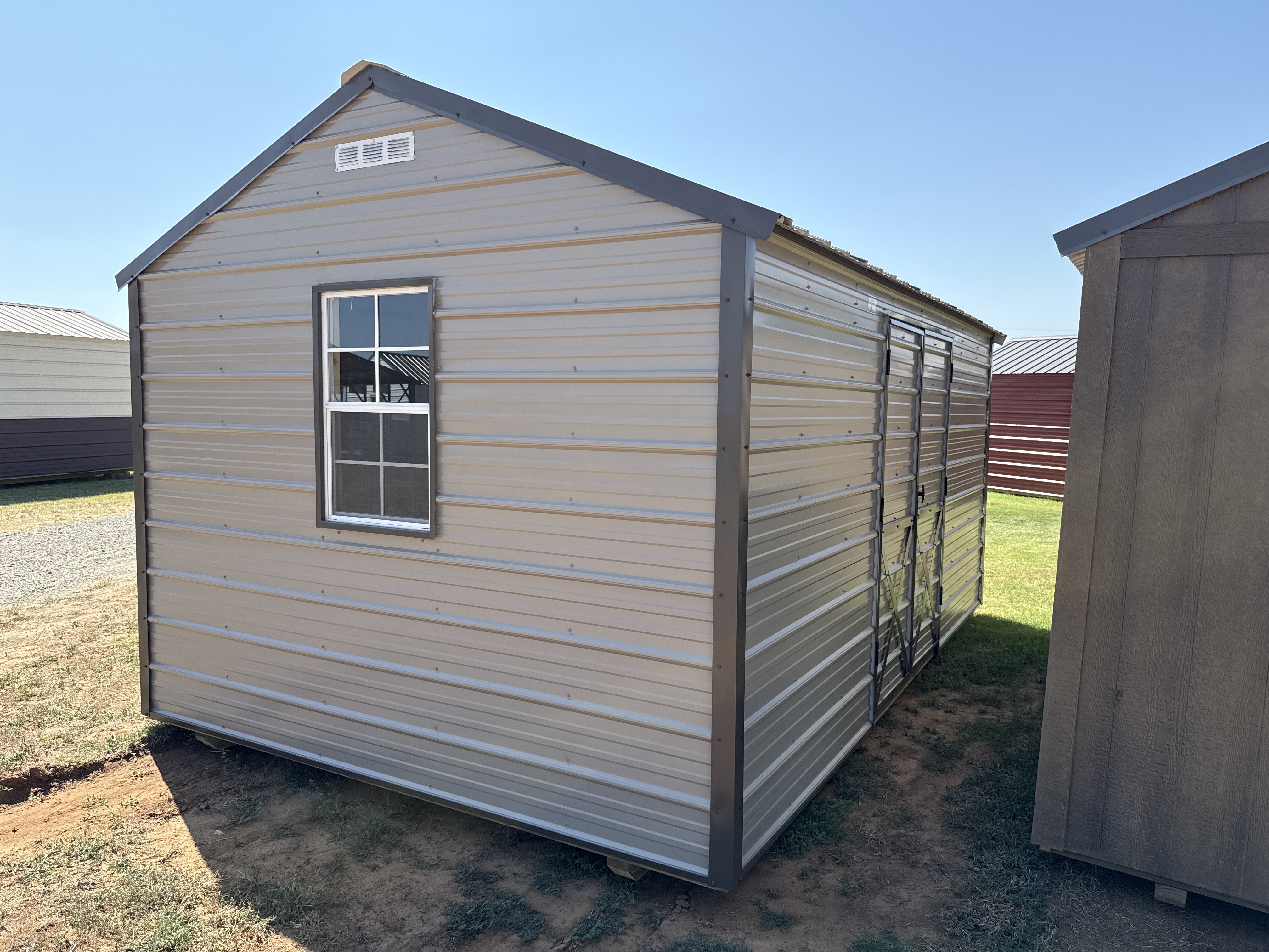 Metal Cottage Barn 10 x 16 photo 2