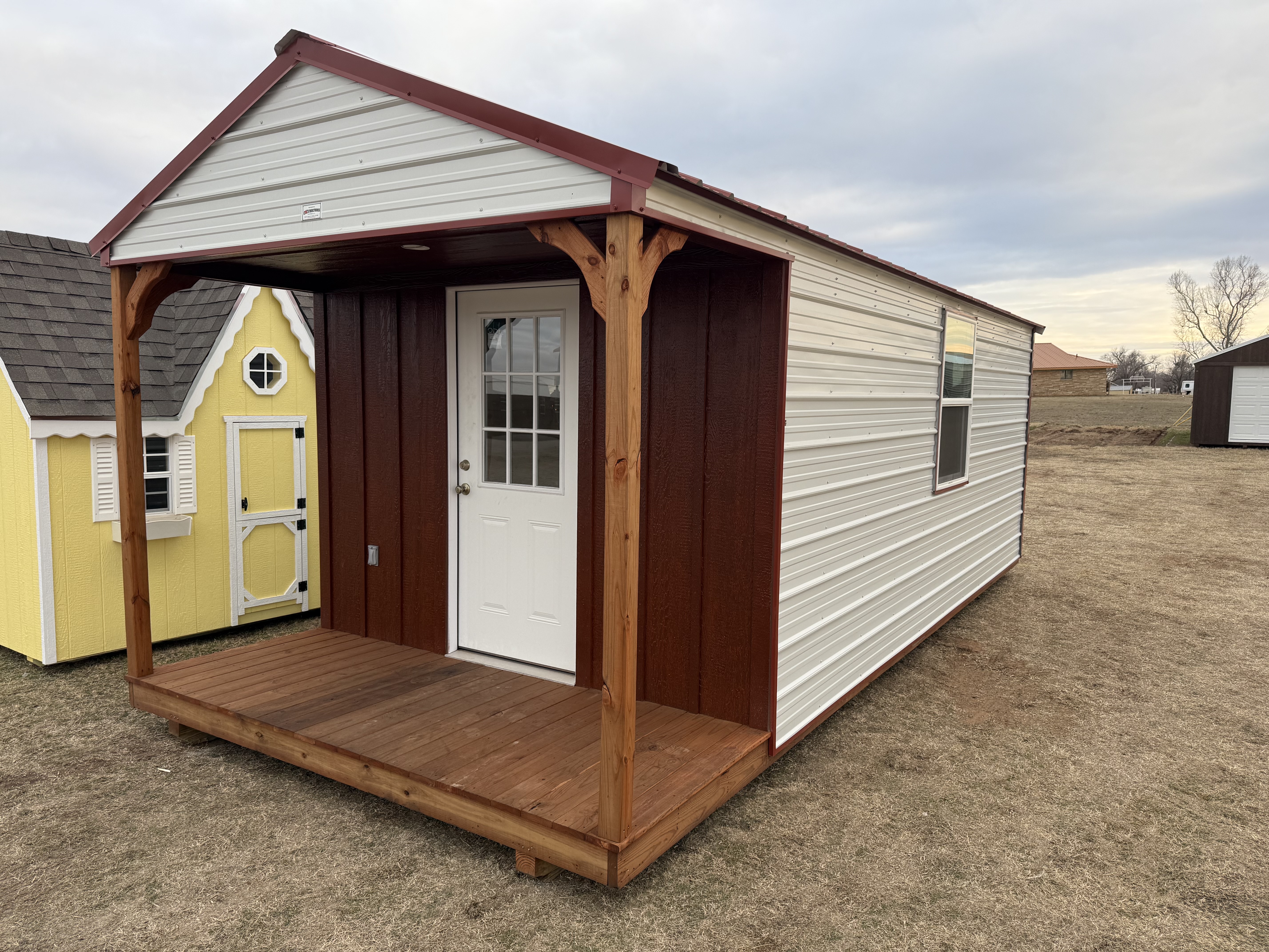 ALERT DISPLAY MODEL! (not for sale) 10x24 Finished Studio w/Porch photo 2